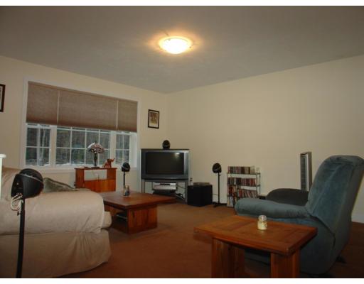 385 Williamsville Road Phillipston, MA 01331 - Photo 6 of 18 a living room with furniture and a flat screen tv
