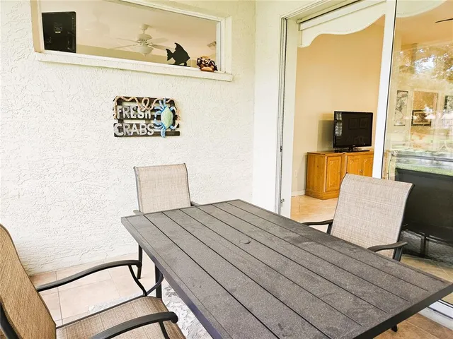 a living room with a bed and furniture