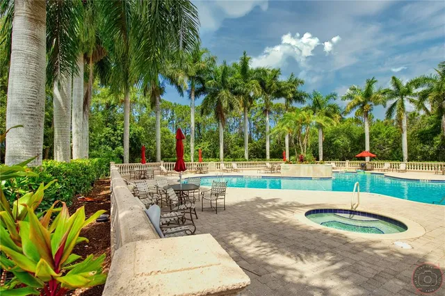 a view of a swimming pool with a patio