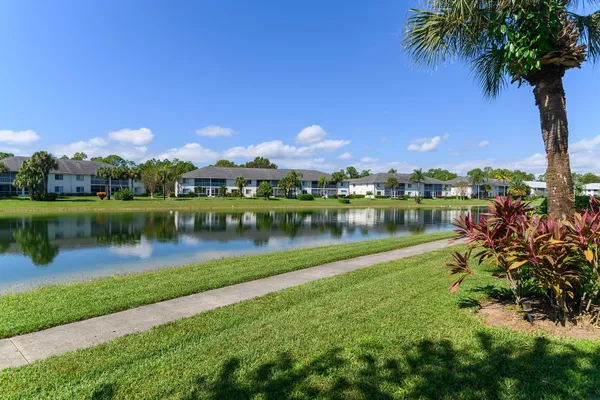 a view of a lake with a big yard