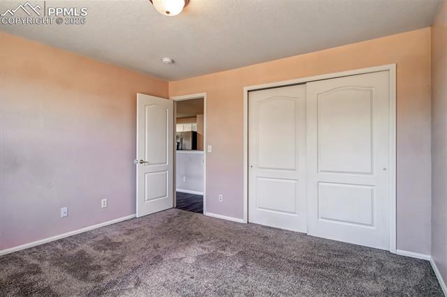3579 Indigo Ridge Point Colorado Springs, CO 80910 - Photo 14 of 33 Primary bedroom