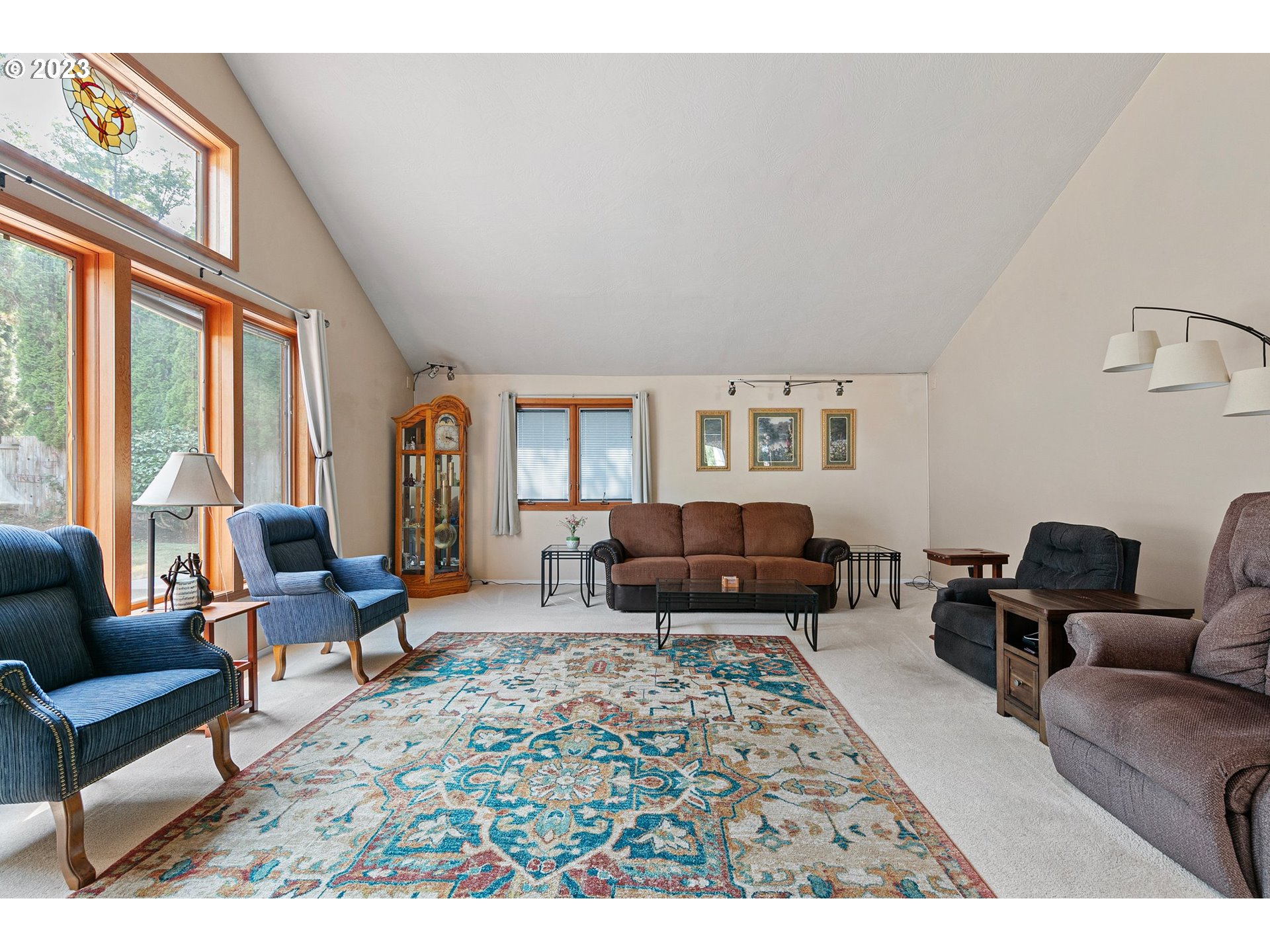 184 73rd Place Springfield, OR 97478 - Photo 12 of 48 a living room with furniture and a large window