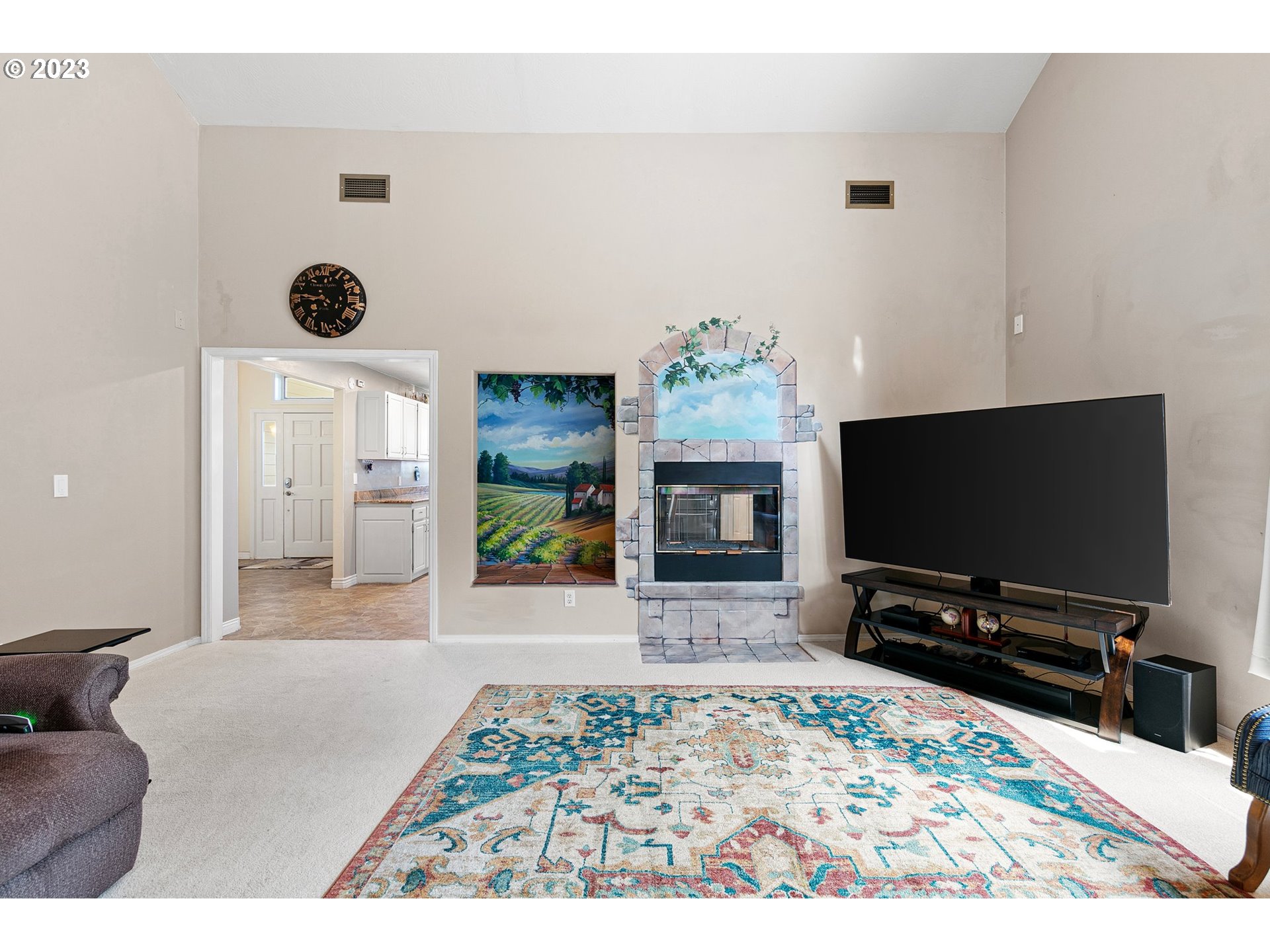 184 73rd Place Springfield, OR 97478 - Photo 15 of 48 a living room with furniture and a flat screen tv