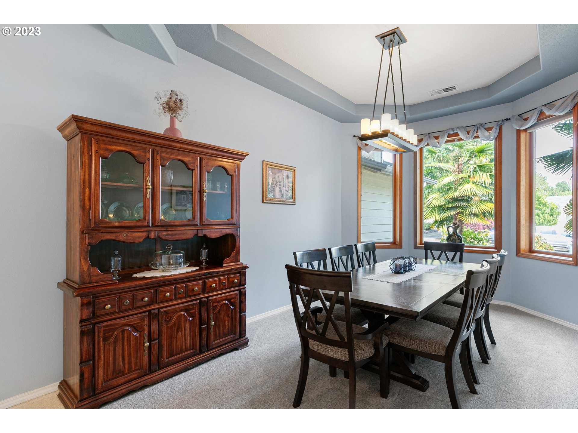 184 73rd Place Springfield, OR 97478 - Photo 18 of 48 a dining room with furniture a chandelier and window