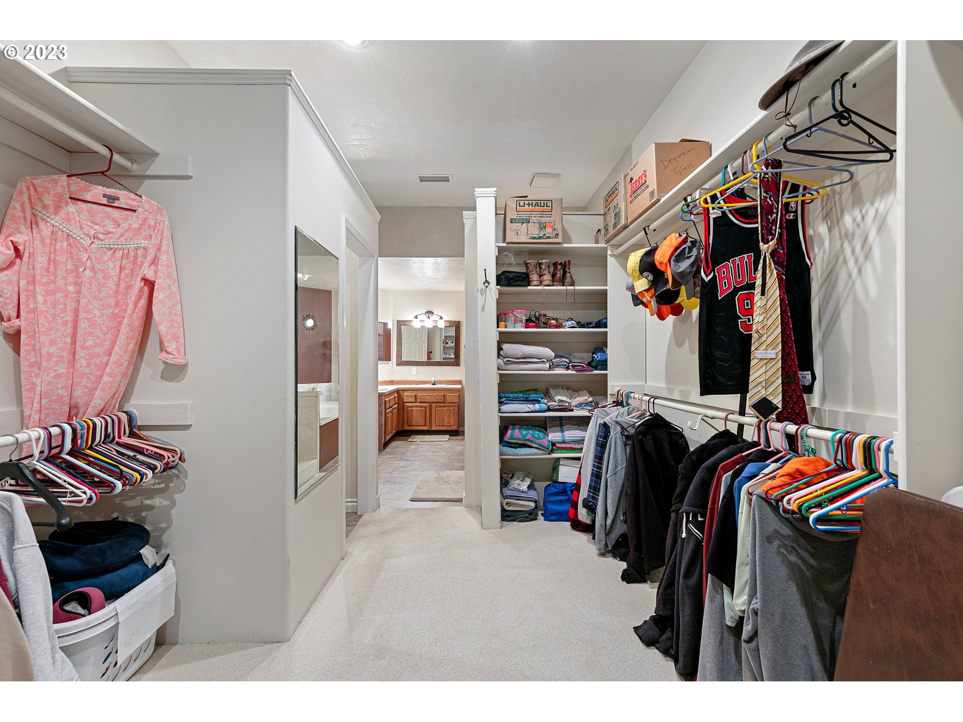 184 73rd Place Springfield, OR 97478 - Photo 28 of 48 a view of walk in closet with clothes and shoes