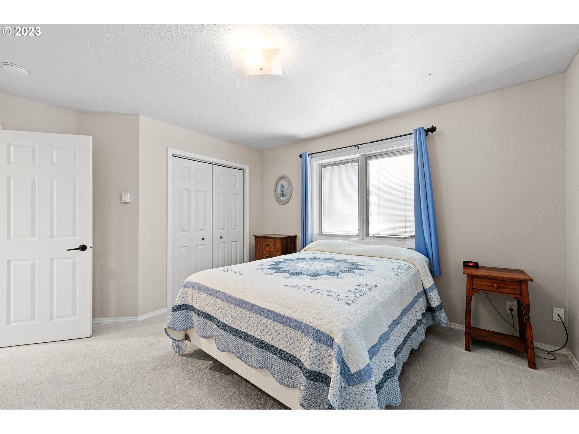 184 73rd Place Springfield, OR 97478 - Photo 32 of 48 a bedroom with a bed and a window