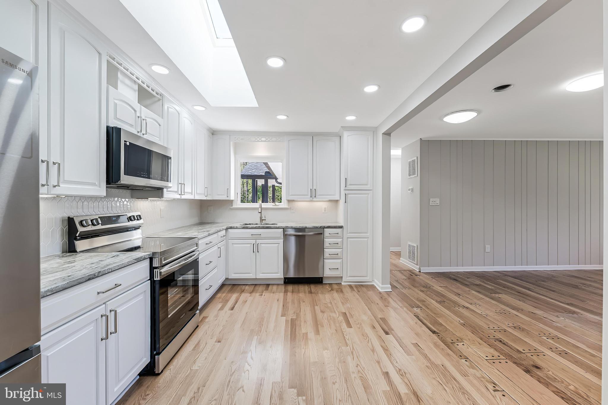 6891 Wilson Road Marshall, VA 20115 - Photo 61 of 118 Modern kitchen with sleek finishes.
