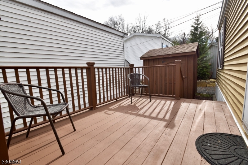 18 Easy Drive Oak Ridge, NJ 07438 - Photo 14 of 15 a view of a wooden deck