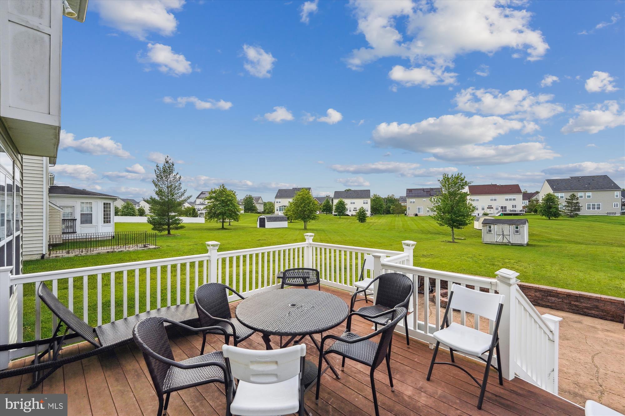 7306 Sudley Avenue Brandywine, MD 20613 - Photo 31 of 46 a view of a chair and table on the deck