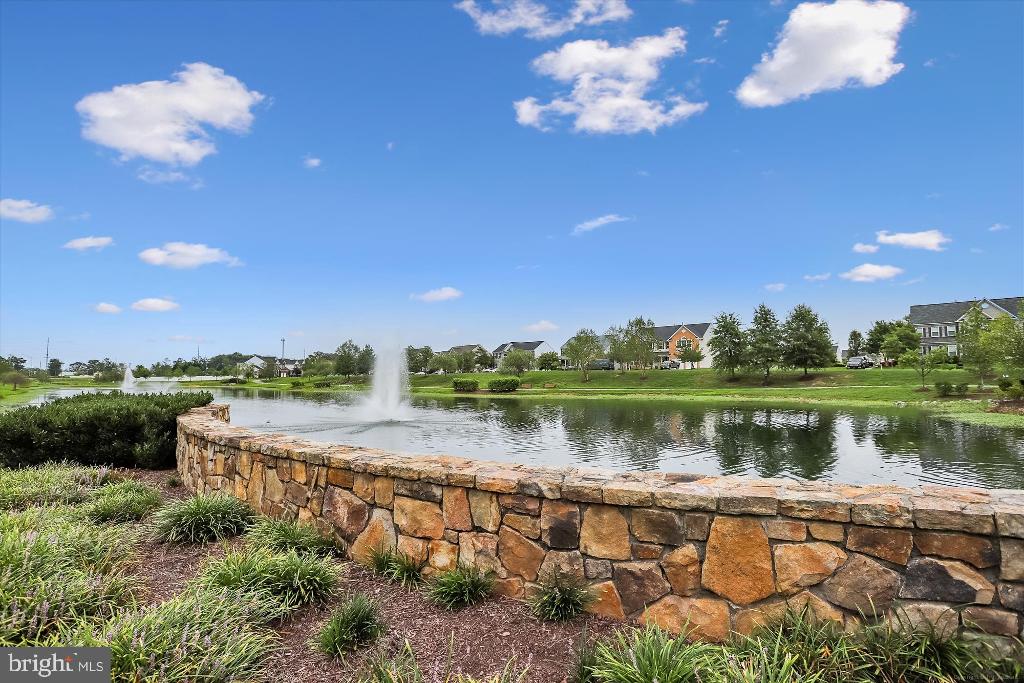 7306 Sudley Avenue Brandywine, MD 20613 - Photo 41 of 46 a view of a lake with a city