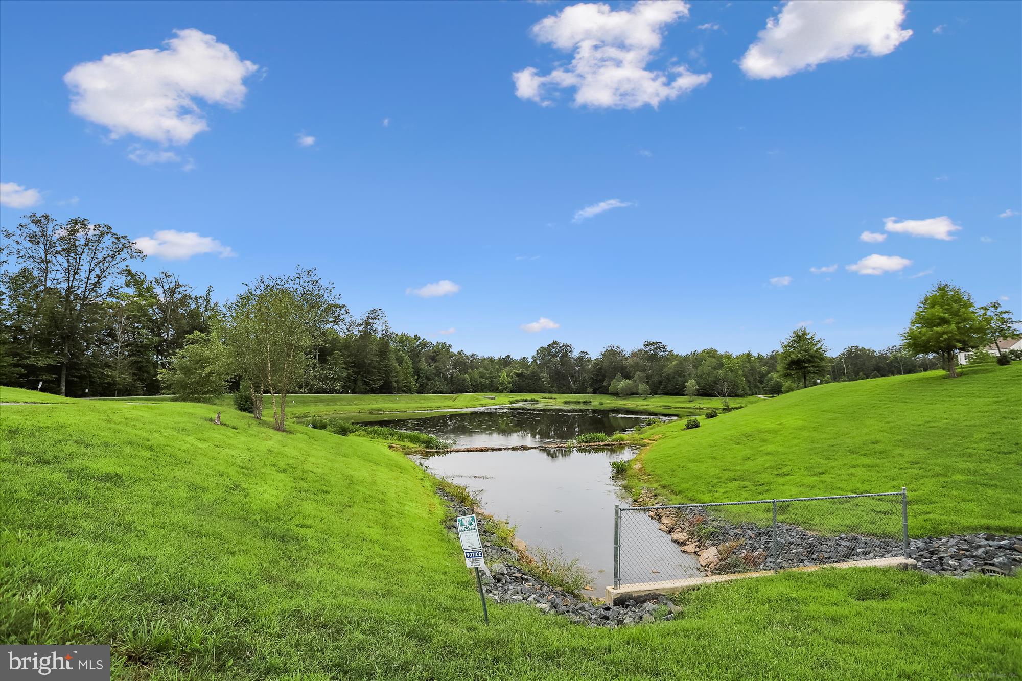 7306 Sudley Avenue Brandywine, MD 20613 - Photo 42 of 46 a view of a lake with a big yard