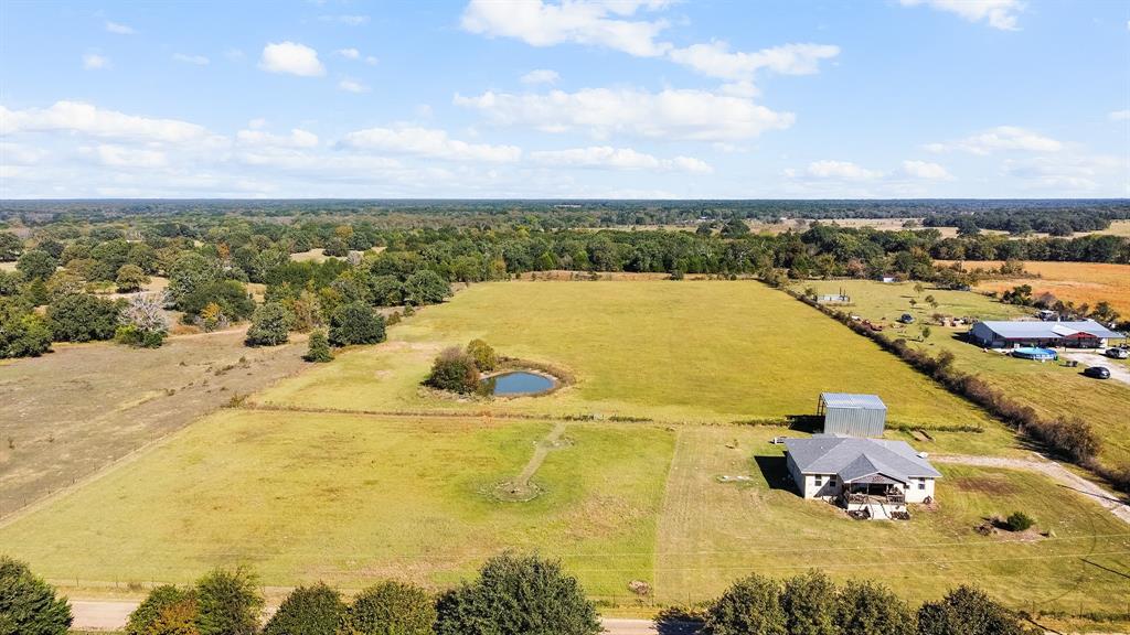 17215 Tarlton Road Mabank, TX 75147 - Photo 13 of 34 a view of a lake with a yard