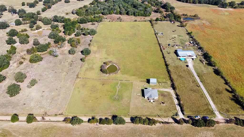 17215 Tarlton Road Mabank, TX 75147 - Photo 16 of 34 an aerial view of residential house with parking