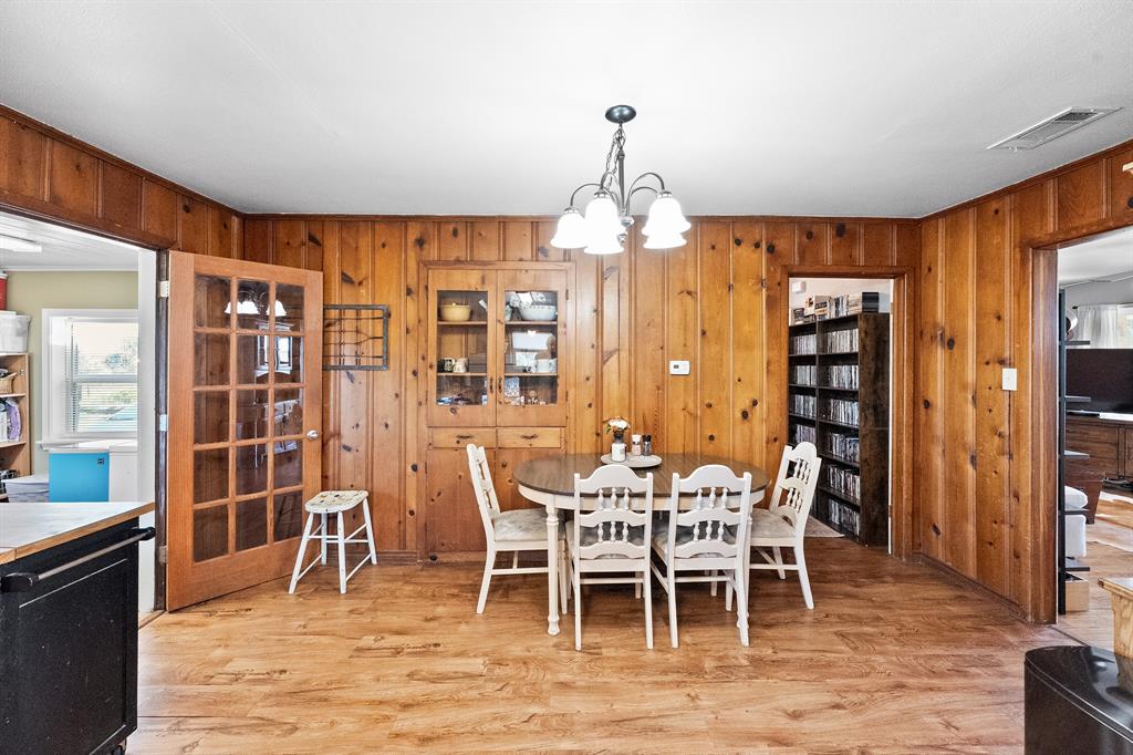 17215 Tarlton Road Mabank, TX 75147 - Photo 21 of 34 a view of a dining room with furniture