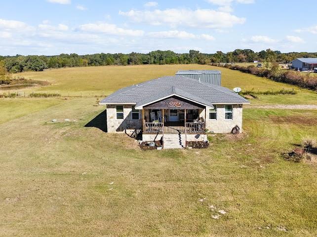 17215 Tarlton Road Mabank, TX 75147 - Photo 6 of 34 a aerial view of a house with a lake view