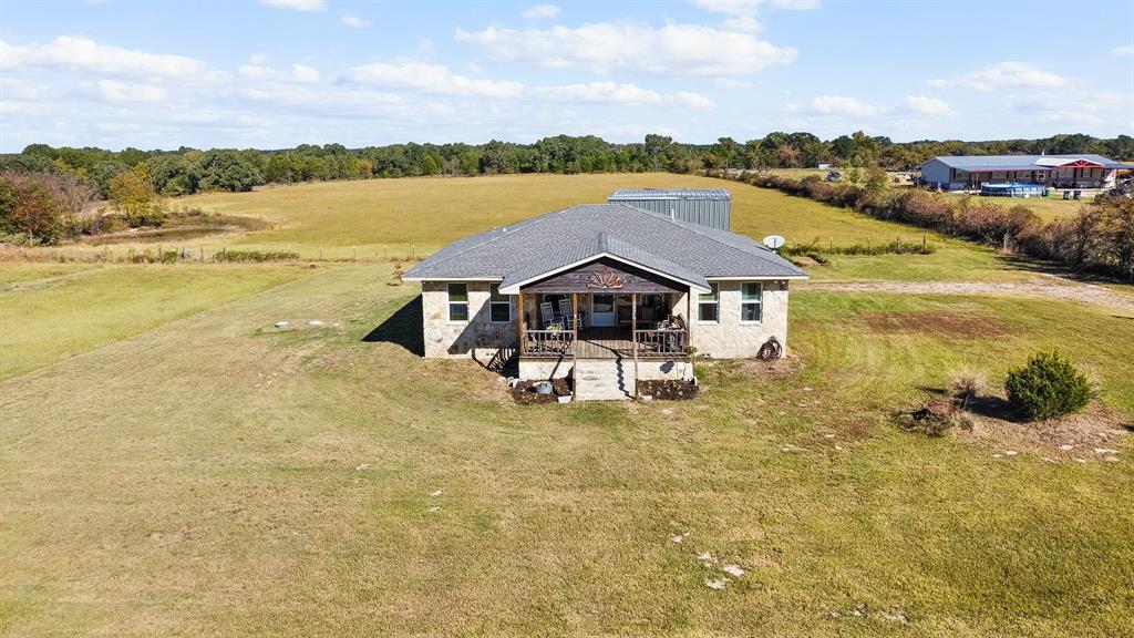 17215 Tarlton Road Mabank, TX 75147 - Photo 7 of 34 a aerial view of a house with a ocean view