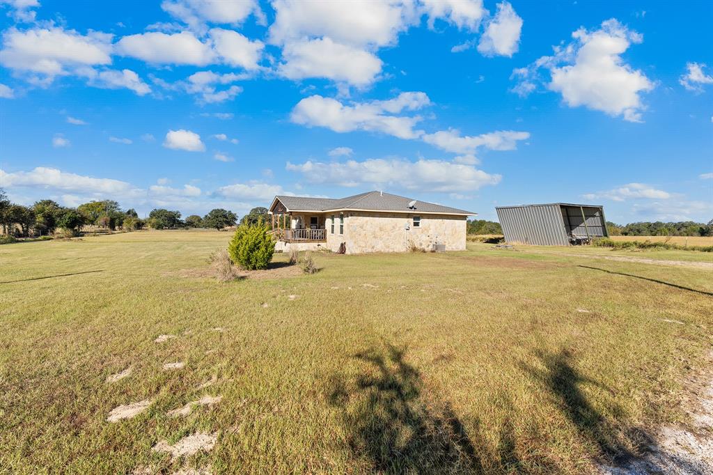 17215 Tarlton Road Mabank, TX 75147 - Photo 9 of 34 a front view of house with ocean view