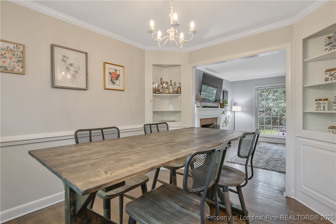 2615 Huntington Road Fayetteville, NC 28303 - Photo 13 of 47 a view of a dining room with furniture