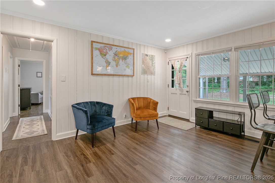 2615 Huntington Road Fayetteville, NC 28303 - Photo 22 of 47 a living room with furniture and a wooden floor