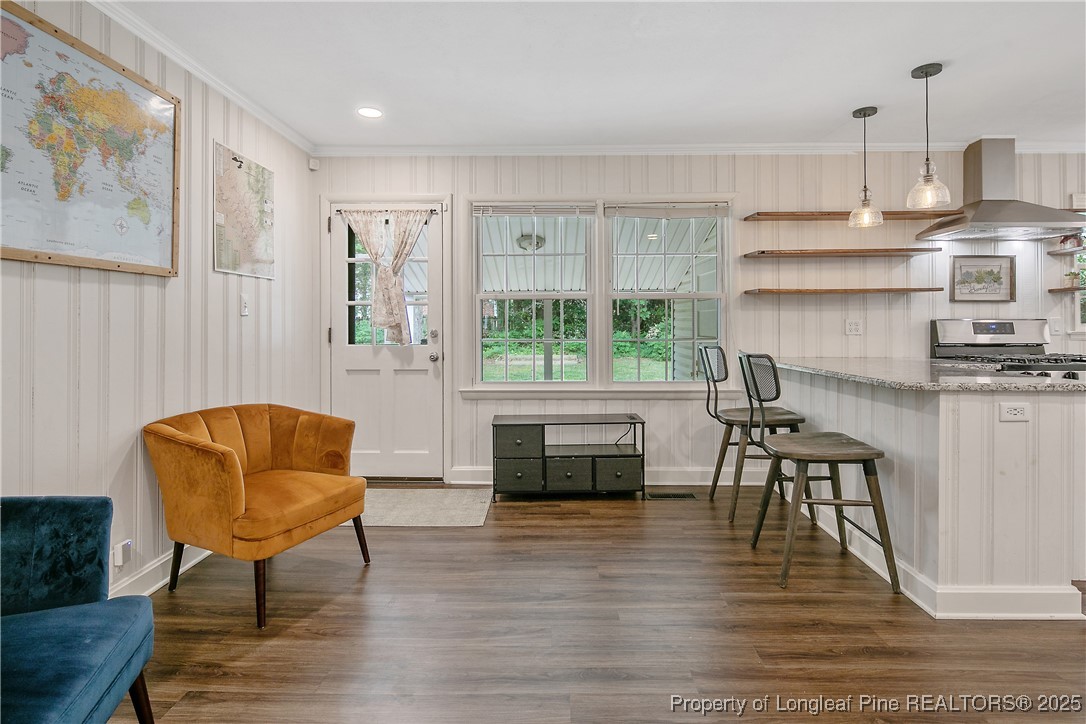 2615 Huntington Road Fayetteville, NC 28303 - Photo 23 of 47 a living room with furniture and a wooden floor