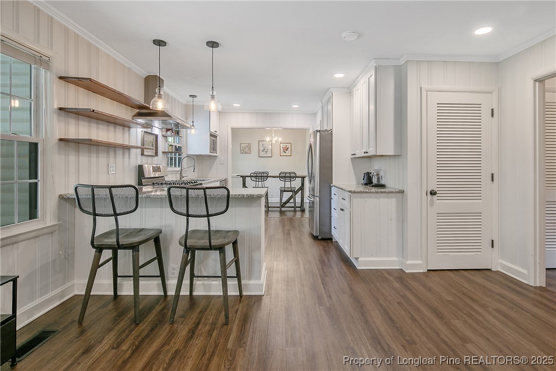 2615 Huntington Road Fayetteville, NC 28303 - Photo 25 of 47 a view of a kitchen and dining room