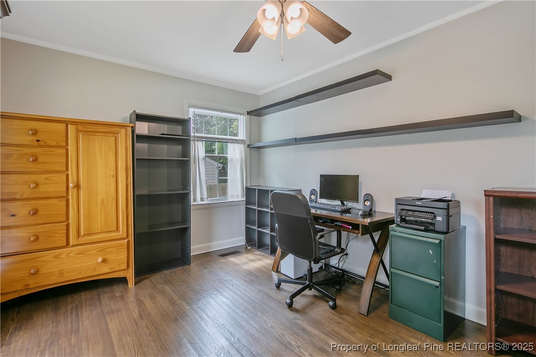 2615 Huntington Road Fayetteville, NC 28303 - Photo 40 of 47 a view of a workspace with furniture and wooden floor