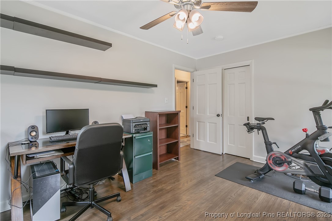 2615 Huntington Road Fayetteville, NC 28303 - Photo 41 of 47 a view of a workspace with furniture and a window