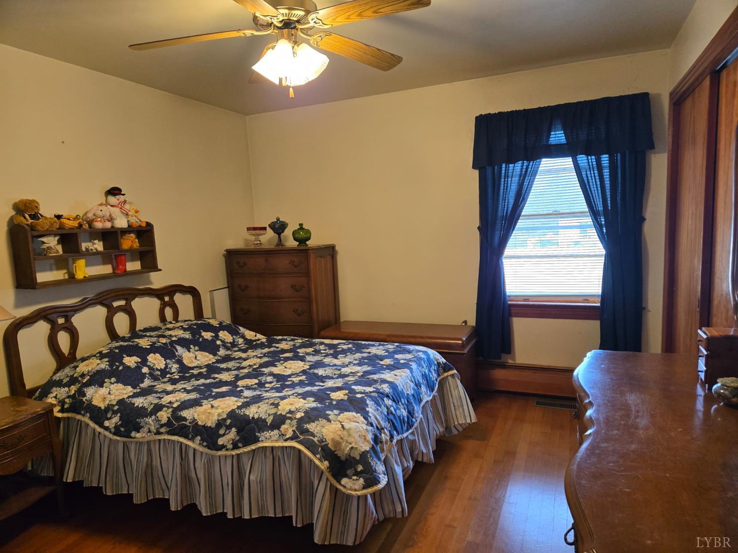 1700 Ward Street Farmville, VA 23901 - Photo 15 of 20 a bedroom with a bed and window