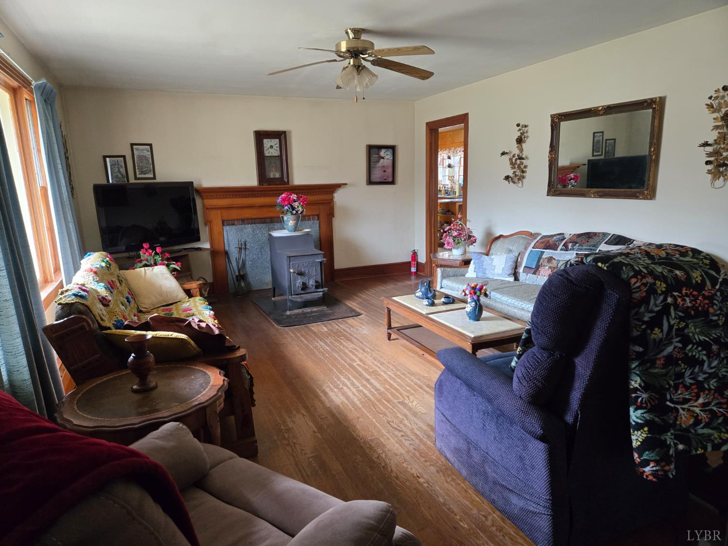 1700 Ward Street Farmville, VA 23901 - Photo 6 of 20 a living room with furniture and a fireplace