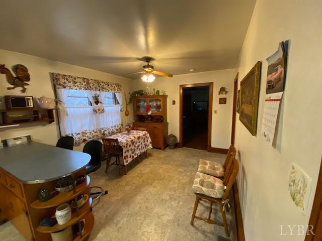 1700 Ward Street Farmville, VA 23901 - Photo 10 of 20 a bedroom with furniture and a flat screen tv