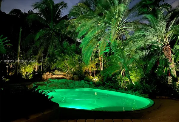 a view of a golf course with a garden