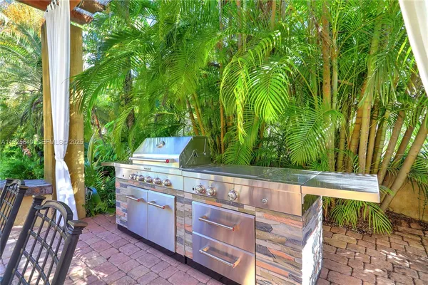 a view of a deck with a back yard