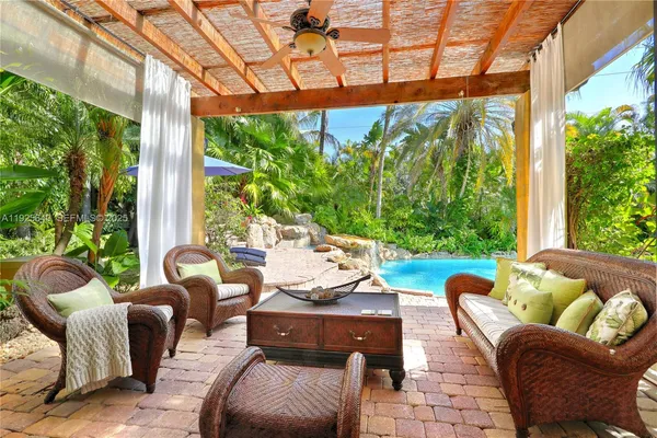 a outdoor living space with furniture and garden view