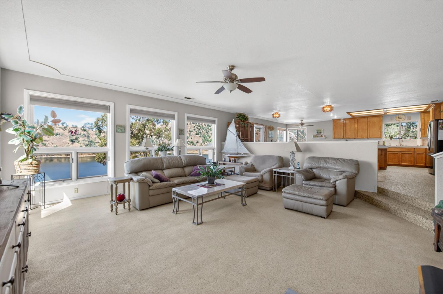 28037 Sky Harbour Road Friant, CA 93626 - Photo 6 of 40 a living room with furniture and a large window
