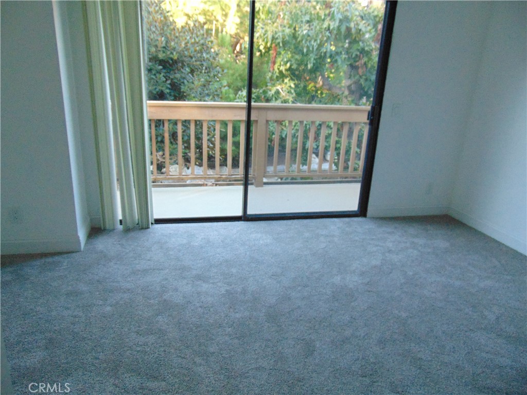 110 Tangelo Irvine, CA 92618 - Photo 13 of 13 a view of an empty room with a balcony