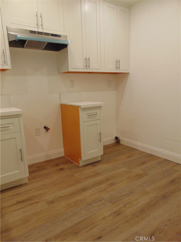 110 Tangelo Irvine, CA 92618 - Photo 4 of 13 a view of empty room with wooden floor