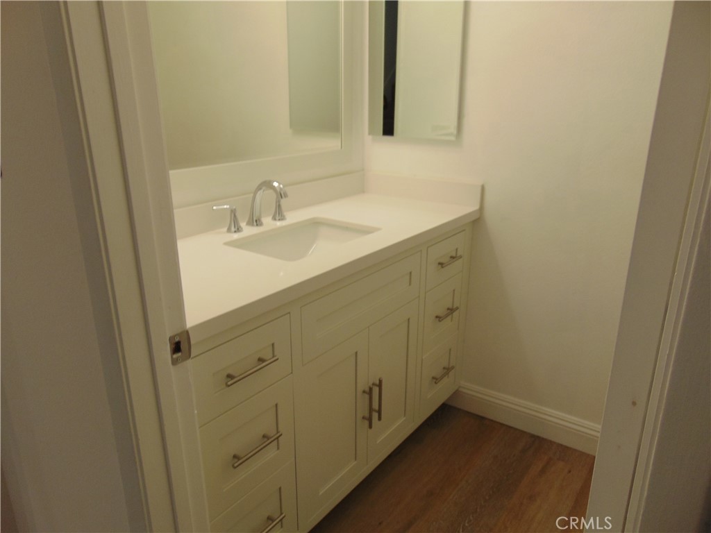 110 Tangelo Irvine, CA 92618 - Photo 9 of 13 a bathroom with a sink and a mirror