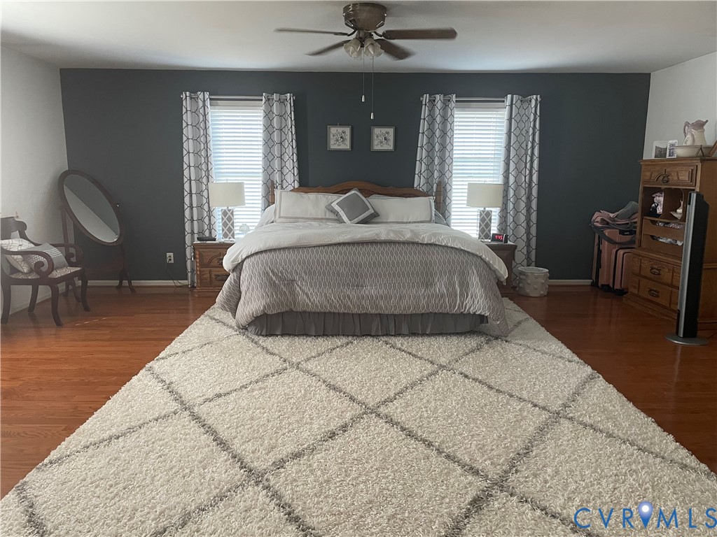 8002 Vaughan Road Petersburg, VA 23805 - Photo 8 of 31 a bedroom with a bed and window