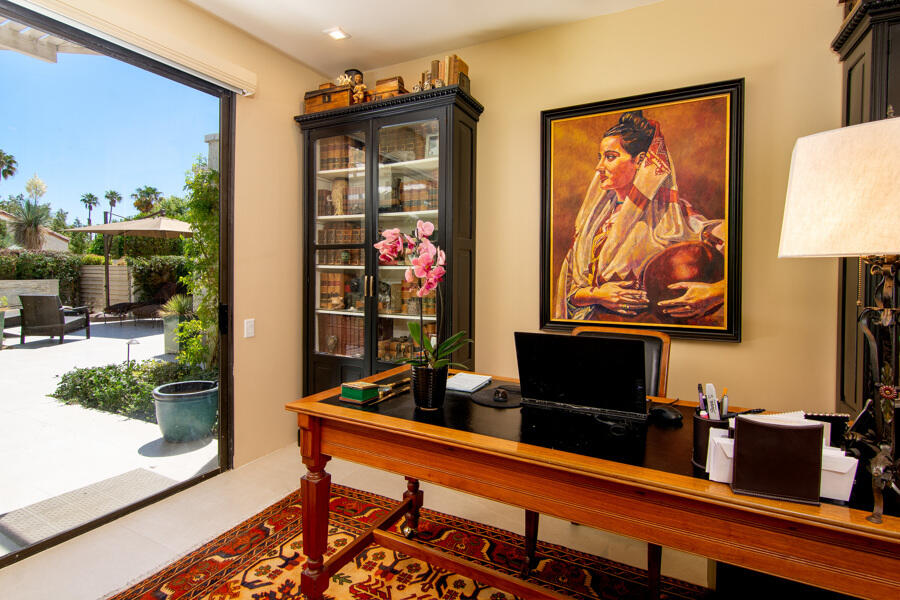 723 Inverness Drive Rancho Mirage, CA 92270 - Photo 15 of 49 a living room with furniture and a flat screen tv