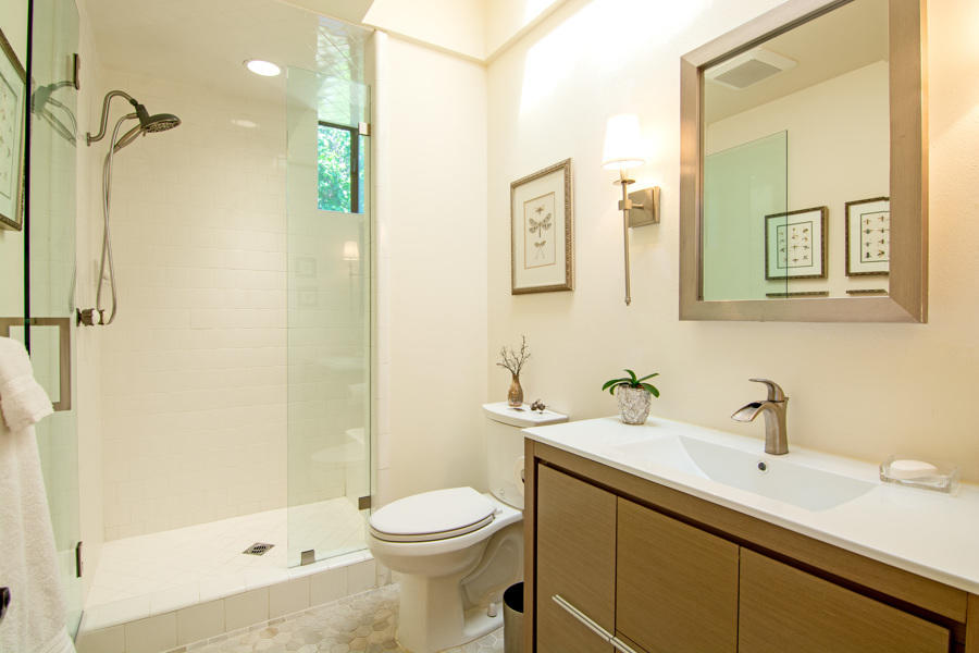 723 Inverness Drive Rancho Mirage, CA 92270 - Photo 16 of 49 a bathroom with a sink a toilet and shower