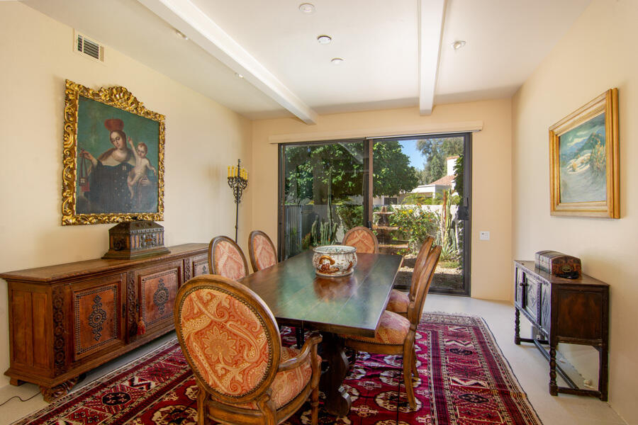 723 Inverness Drive Rancho Mirage, CA 92270 - Photo 3 of 49 a view of a dining room with furniture window and outside view
