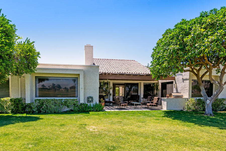 723 Inverness Drive Rancho Mirage, CA 92270 - Photo 30 of 49 a view of a house with sitting area and garden