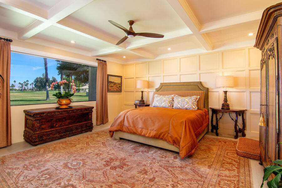 723 Inverness Drive Rancho Mirage, CA 92270 - Photo 5 of 49 a bedroom with a bed and a walk in closet