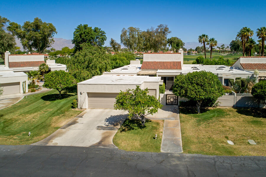 723 Inverness Drive Rancho Mirage, CA 92270 - Photo 42 of 49 an aerial view of a house with yard swimming pool and outdoor seating