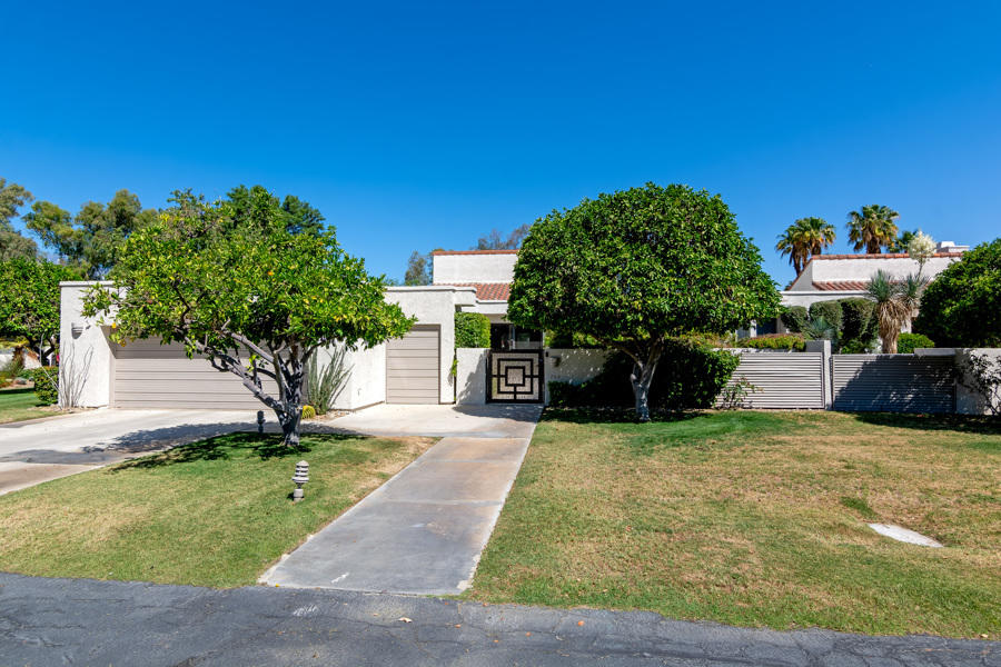 723 Inverness Drive Rancho Mirage, CA 92270 - Photo 44 of 49 a view of a house with backyard and a tree