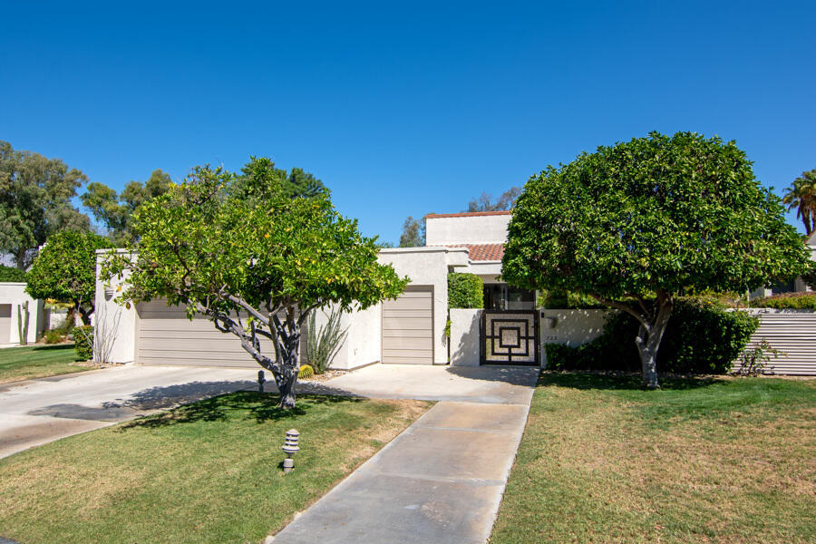 723 Inverness Drive Rancho Mirage, CA 92270 - Photo 47 of 49 a view of a yard with plants and a tree
