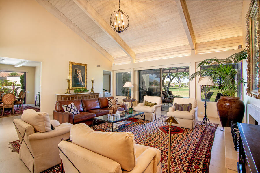 723 Inverness Drive Rancho Mirage, CA 92270 - Photo 8 of 49 a living room with furniture a table and chairs
