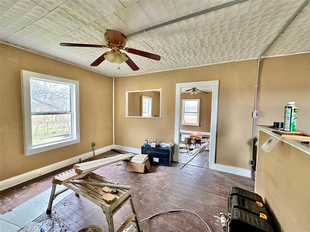 6049 Farm Road 3236 Dike, TX 75437 - Photo 8 of 12 a living room with furniture and wooden floor