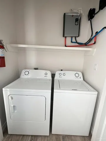 a utility room with dryer and washer