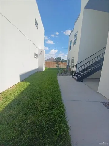 a view of a balcony with staircase